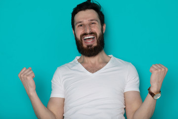 Fototapeta premium Portrait of cheerful smiling bearded man