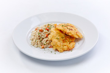 fried chicken breast with barley on the white background