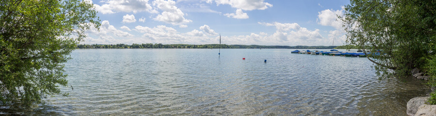 Stop, halt Sight warn for nature protection landscape in German language taken from a Kayak. Water plants, reed and Island Wörth . Clear, cloudy day. In Woerthsee, Bavaria, Starnberg, Germany.
