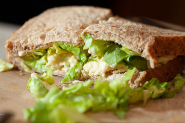 Making egg and onion sandwiches