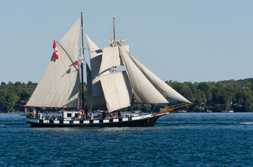 Tall ship under fulll sail off the New York  State Coastline.