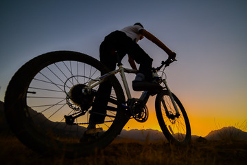 Fototapeta na wymiar adventurous biker trip at dawn