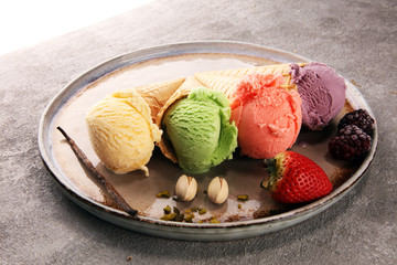 Set of ice cream scoops of different colors and flavours