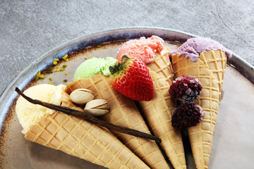 Set of ice cream scoops of different colors and flavours