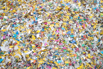 Fototapeta na wymiar recycling shredded plastic pieces