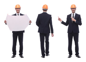 in full growth .a qualified architect in an orange helmet