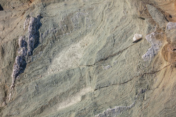 Natural stone background texture, gray green color