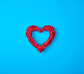 wicker red heart on a blue background