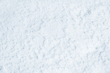 Fresh snow background texture. Winter background with snowflakes and snow mounds. Snow lumps.