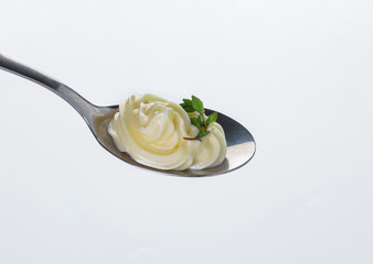 spoon with sauce isolated on white background