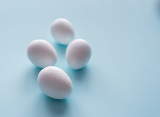 Hand painted easter eggs on clean neutral background. Spring and Easter holiday concept.