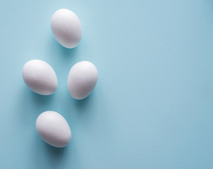Hand painted easter eggs on clean neutral background. Spring and Easter holiday concept.