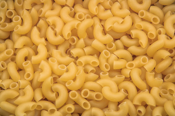 raw russian pasta makaroni background close up