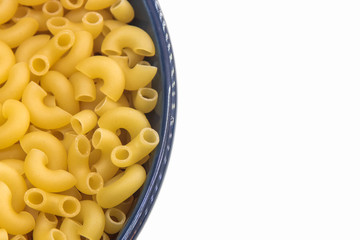 raw russian pasta makaroni in the blue bowl