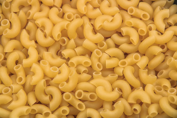 raw russian pasta makaroni background close up