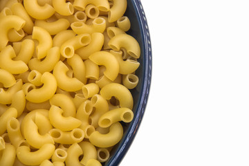 raw russian pasta makaroni in the blue bowl