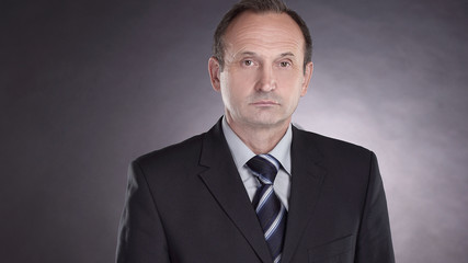 portrait of a modern businessman.isolated on black background