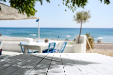Desk of free space and summer bar on beach 