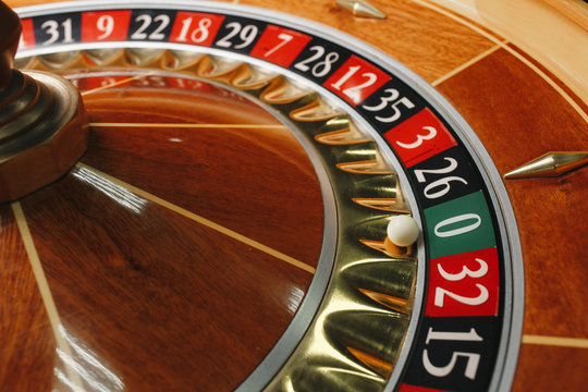 beautiful casino roulette close-up with playing chips