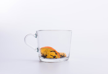 Glass cup with black tea and lemon Isolated on white background
