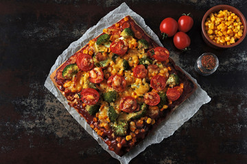 Vegan pizza with vegetables and sauce. Healthy fast food. Keto pizza. Square pizza.