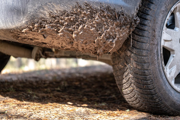 Fototapeta na wymiar very dirty offroad car covered in mud