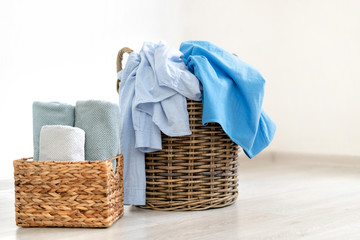 Laundry room interior with basket of clothes