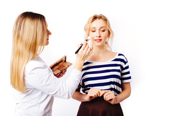 The process of creating makeup.
