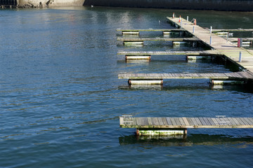 Pontoon wooden jetty pier for boat mooring marina at sea