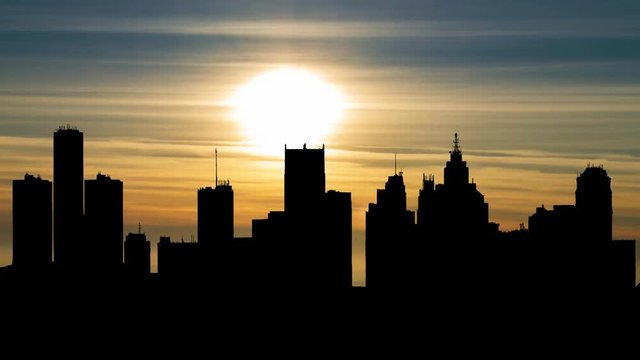 Detroit: Time Lapse at Sunset of Cityscape in Silhouette , Michigan, USA
