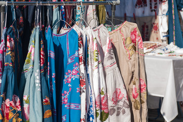 national Ukrainian clothes are sold at the fair, hanging on a hanger