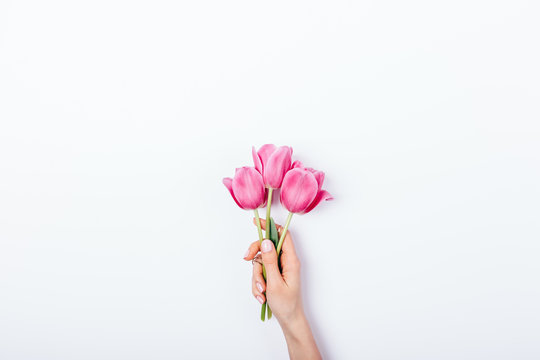 Woman's Hand Holding Small Bouquet