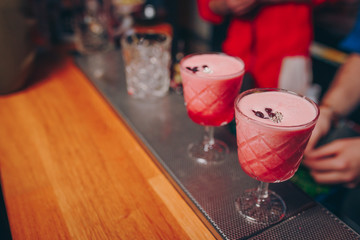 Sweet Famous juicy craft cocktails with candy decorative  Author inspired Cocktail Drink -on bar counter . Close-up Top view . Copy paste for elegant design and luxury service barman in nightclub