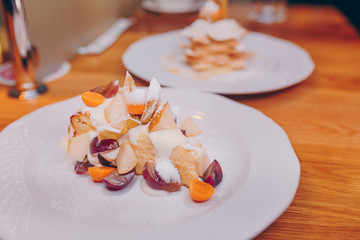 Eat sweet dessert cuisine tart food in cafe menu.Pastry products close up.Delicious menu item in restaurant.Enjoy fresh Layered cake vanilla custard served fruit slices peach exotic cream pie Diet.