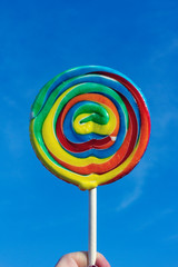 colorful lollipop on blue background