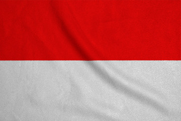 Flag of the Indonesia from the factory knitted fabric. Backgrounds and Textures