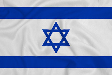 Flag of the Israel from the factory knitted fabric. Backgrounds and Textures