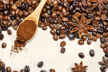 Coffee and spices on a light wooden table