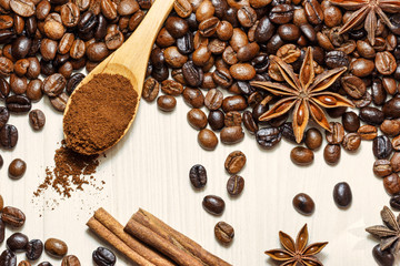 Coffee and spices on a light wooden table
