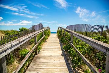 Fototapeta na wymiar wooden bridge to beach