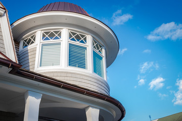 Copper roofed turret against blue skies. © Benjamin Clapp