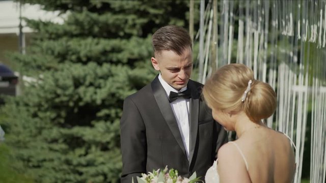The groom cries at the exit ceremony. The groom was moved and started up a tear. Sentimental groom.The groom cries