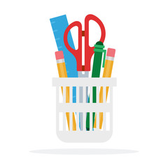 Stationery items in a glass