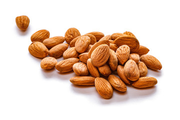 The heap of almond isolated on white background.
