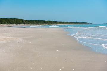 Beautiful beach in bright sky.