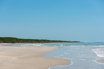Beautiful beach in bright sky.