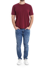Obraz premium Young man on white background, closeup. Weight loss