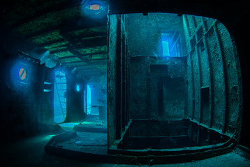 A natural light shot from inside a shipwreck. The image has been taken in low light without a...
