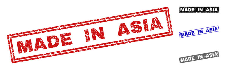 Grunge MADE IN ASIA rectangle stamp seals isolated on a white background. Rectangular seals with grunge texture in red, blue, black and grey colors.