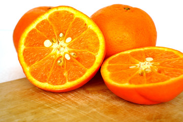 Close up of golden orange isolated on white background with copy and paste space